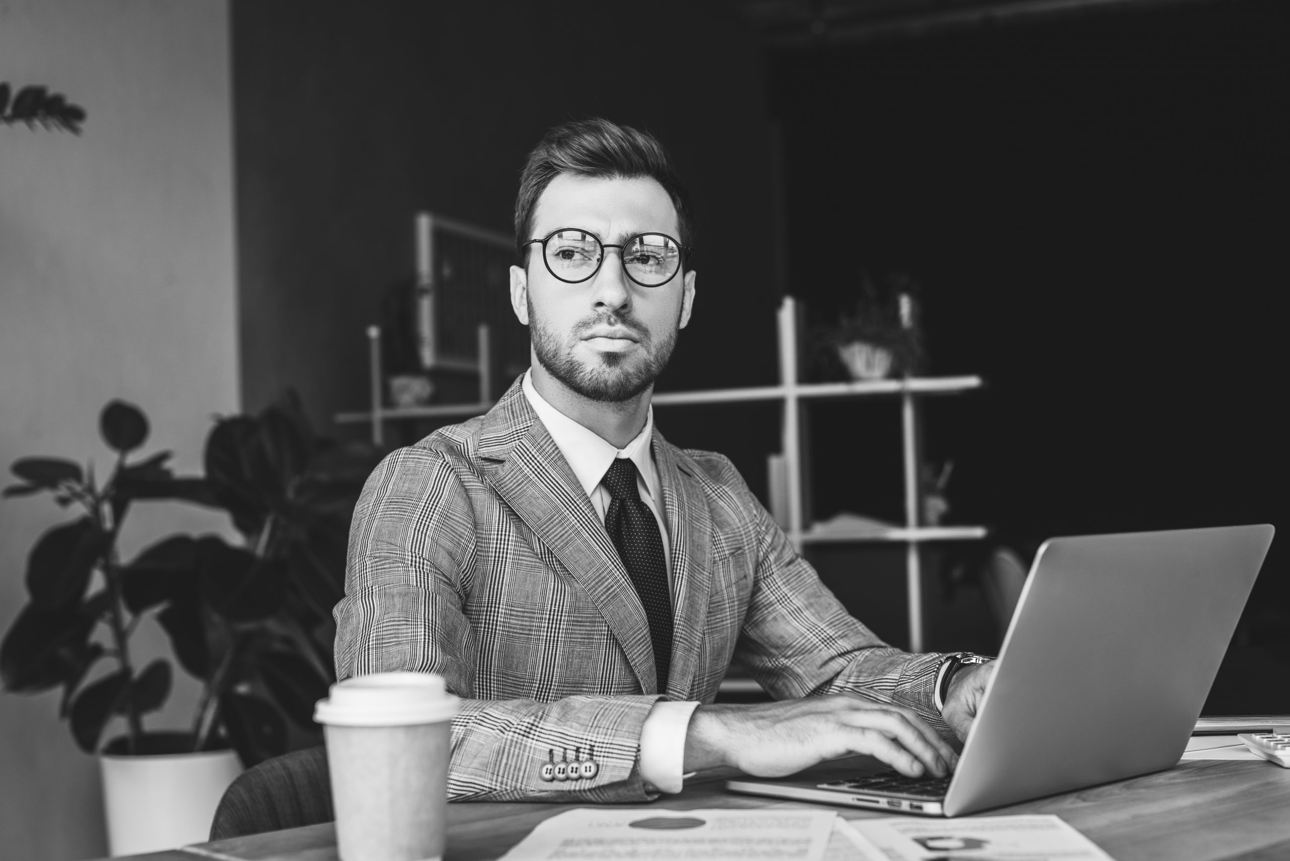 businessman working with laptop Modernizing the month-end close