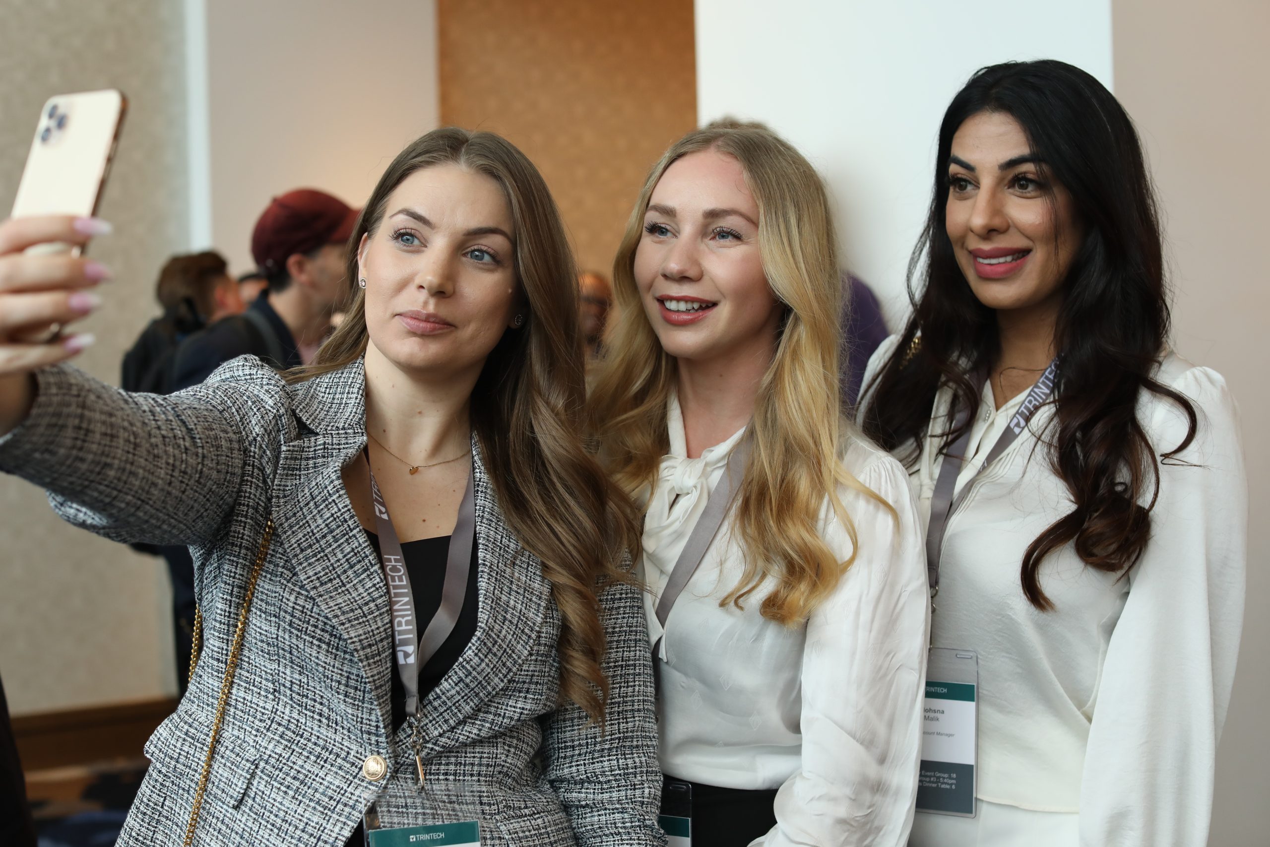 Trintech staff taking a selfie at an event