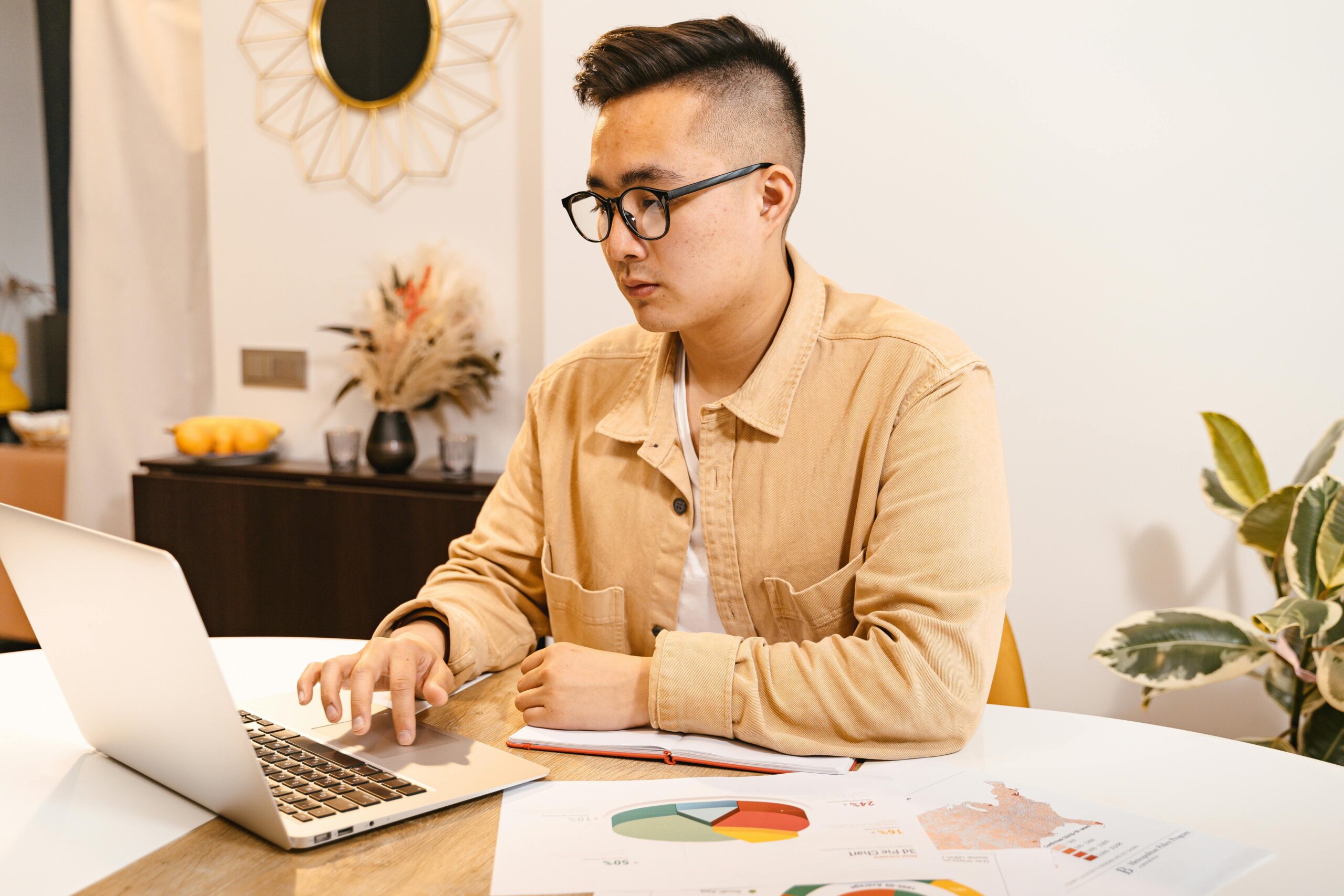 Young man working from his laptop