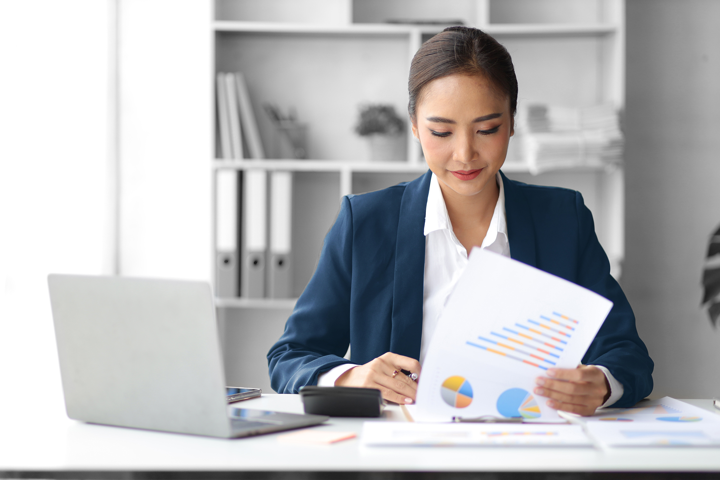 Image of cfo working at her desk