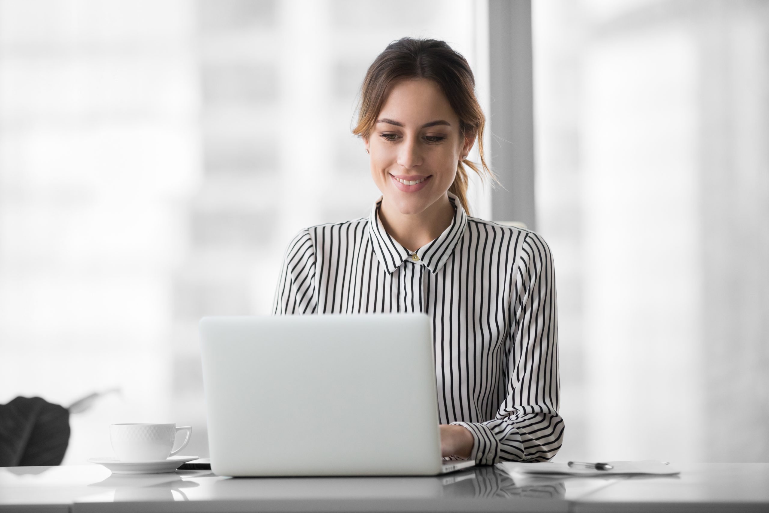 Woman working on lap top