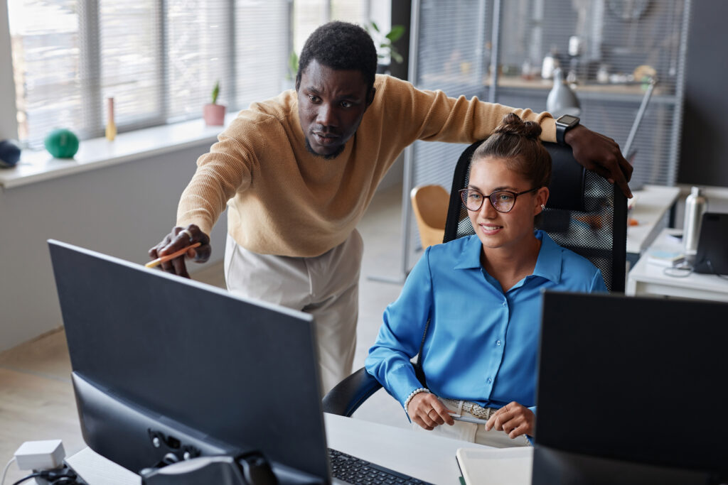 Colleagues developing new program in team